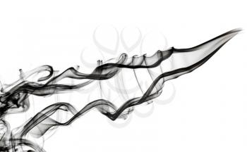 Abstraction: black smoke swirls pattern over black backgroun d