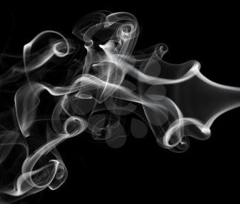 Abstraction: white smoke pattern over black backgroun d