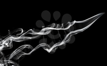 Abstraction: white smoke swirls pattern over black backgroun d