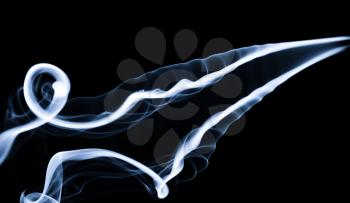 Fume: White smoke abstraction over black background.