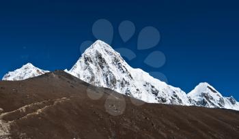 Pumori and Kala Patthar mountains in Himalayas. At height 5100 m