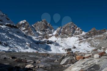 Renjo pass: mountain peaks and stream in Himalayas. Captured in Sagarmatha National park