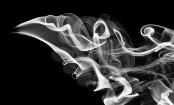 White smoke abstraction with swirls over black background