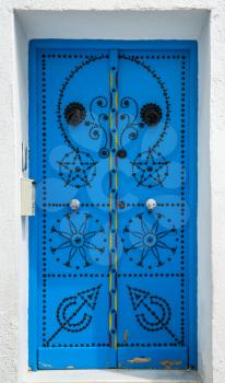 Traditional blue door from Sidi Bou Said in Tunisia. Large resolution