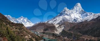 Panoramic view of Ama Dablam, Everest and Lhotse. himalaya village on foreground