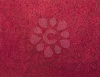 Magenta handmade asian paper texture with scratches. Useful as background