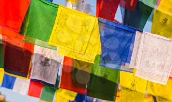 buddhist Prayer Colorful flags with mantras. religion in Asia