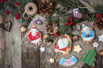 Christmas pastry and decorated cookies in rustic style. Free space for text