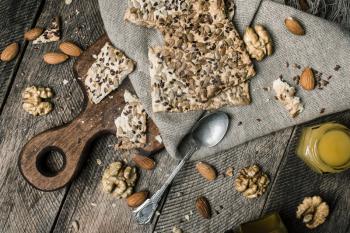Cookies with seeds  nuts honey for lunch. Rustic style and autumn food photo