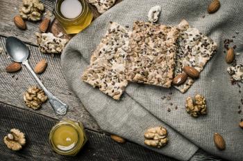 dietic cookies with honey and nuts on rustic table. Rustic style and autumn food photo