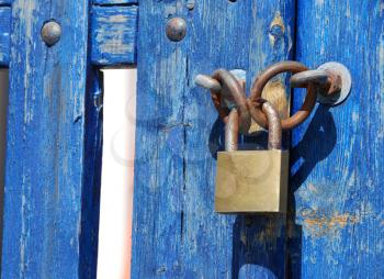 Royalty Free Photo of a Padlock on a Wooden Gate