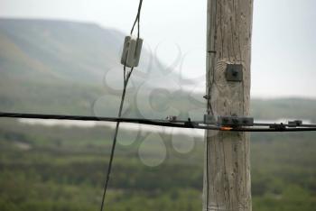 Royalty Free Photo of a Pole and Wires