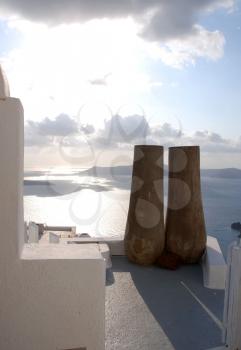 Royalty Free Photo of Tree Trunk Urns in Santorini