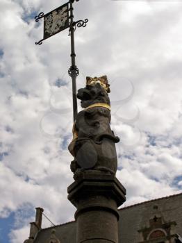 Heraldic symbol atop of building in Ghent, Belgium.
