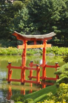 Japanese Garden and pond with a red Zen Tower.