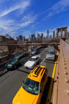 Views of New York City, USA. Traffic on Brooklyn Bridge.