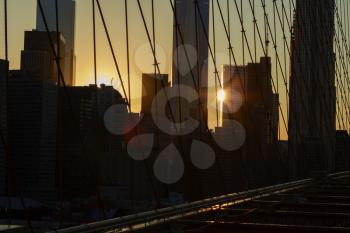 Bright lights of New York City at sunset.