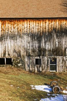 Old weathered barn on a farmland.