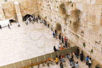 Jerusalem, Israel-March 14, 2017: The Western Wall is the holiest place where Jews are permitted to pray, though it is not the holiest site in the Jewish faith, which lies behind it, on Temple Mount.