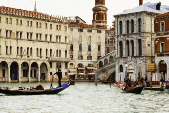 Venice, Italy-April 1, 2013: Street views of canals and ancient architecture of Venice, Italy.