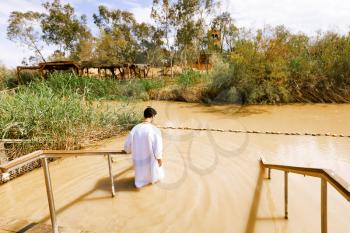 Qasr el Yahud, Israel- March 14, 2017: Qasr el Yahud is the official name of a baptism site on the Jordan River that is egally part of the State of Palestine, but under Israeli occupation, visited by 500,000 pilgrims annually.