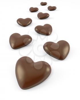 Few heart shaped chocolate candies, isolated on white background