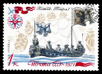 Royalty Free Clipart Image of a Boat on a Stamp