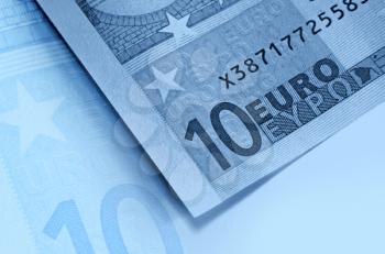 fragment of ten euro money, blue abstract background
