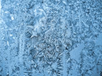 frosty natural pattern on winter window glass