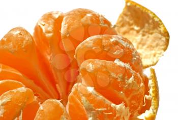 fragment of tasty mandarin (tangerine) isolated on white