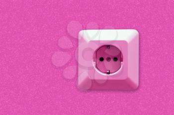electric socket on wall, pink abstract background