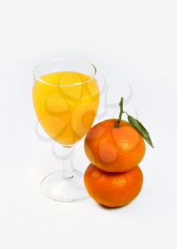 orange juice and two mandarin fruits isolated on white background