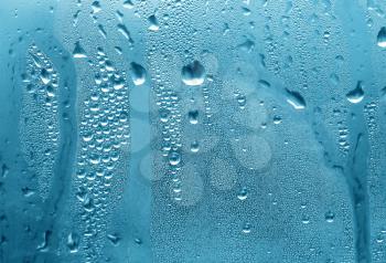 close up of natural water drops on glass
