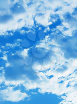 clouds on blue sky vertical background