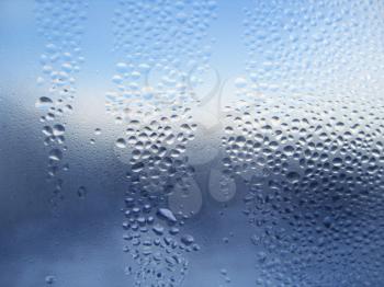 Natural water drops on window glass 