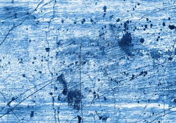 blue paint on the white abstract background
