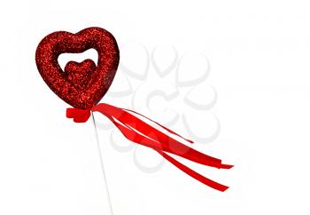 Heart on a stick with red ribbon on white