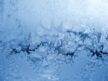 frosty natural pattern on winter windowpane