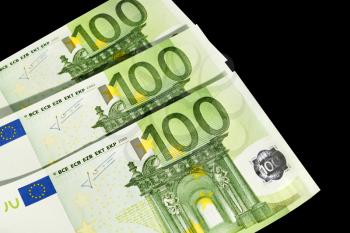 hundred euro money isolated on black background