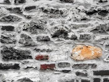 Texture of very ancient stone wall