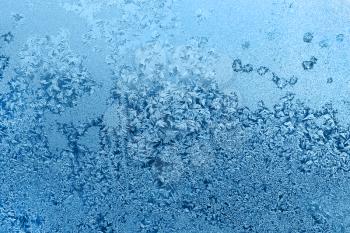 Beautiful ice pattern on winter window glass