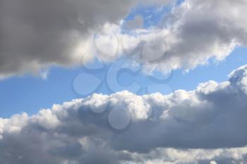 grey clouds in the blue sky background