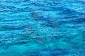Transparent blue sea water natural background