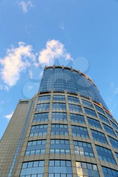 Office modern building against the evening sky with white clouds, Moscow, Russia     
