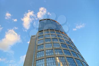 Office modern building against the evening sky with white clouds, Moscow, Russia     