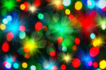 Holiday background from color unfocused lights