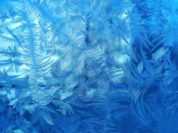 Texture of beautiful ice pattern on winter glass