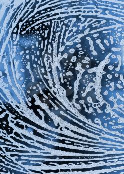 Blue background with pattern of natural soap foam