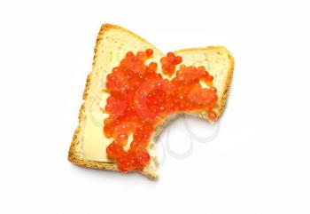 Freshly made red caviar and butter sandwich with bread that has been bitten on a white background