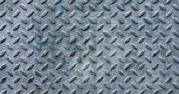 Texture of old metal diamond plate covered with paint